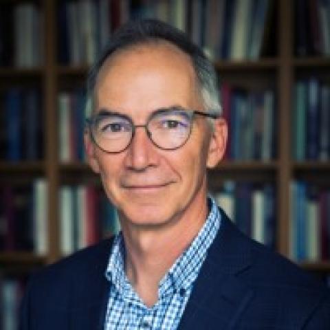 A headshot photo of Michael Frohna