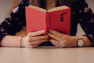 Woman reading a book.