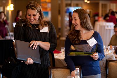 Young professionals reviewing job opportunities. 